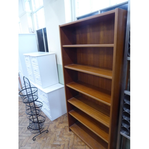 Tall teak bookcase