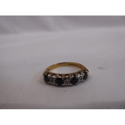 42 - 9ct gold sapphire and diamond eternity ring