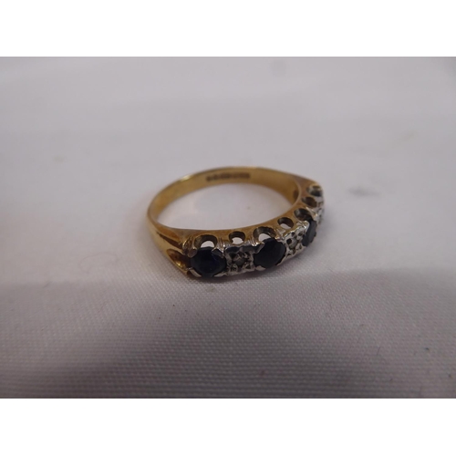 42 - 9ct gold sapphire and diamond eternity ring