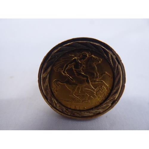 45 - 1912 gold sovereign mounted in 9ct gents ring (9.1g total)