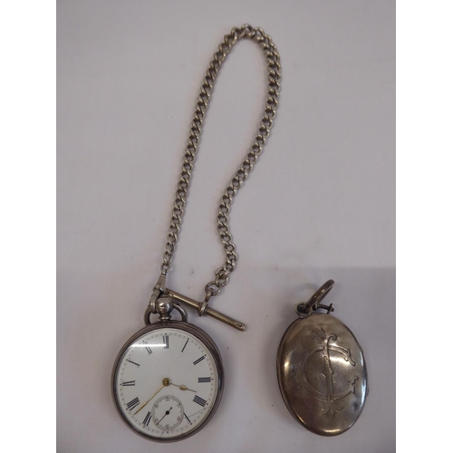61 - Silver pocket watch on chain and white metal locket