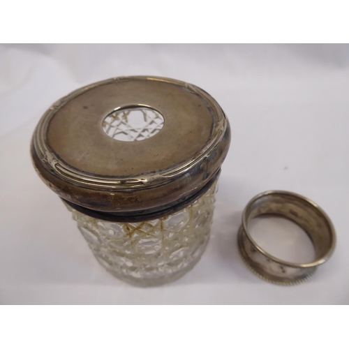 91 - Silver top cut glass hat pin jar and a napkin ring