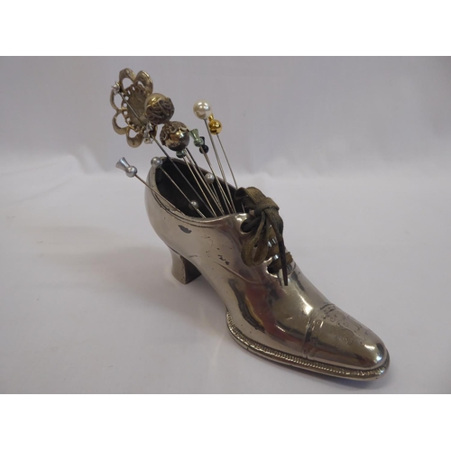 93 - Plated metal ladies shoe and 10 hat pins