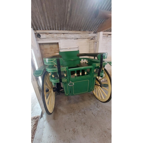 12 - A Governess Cart 
This cart has been redecorated and is originally dated early 19th century with fro... 