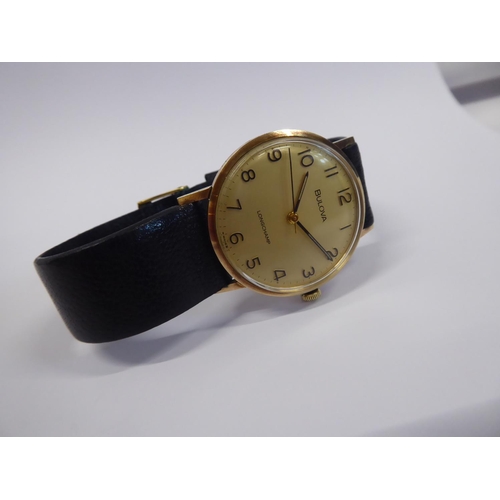 46 - Bulova 9ct gold cased wristwatch (long service inscription to back) on original leather strap in box