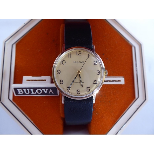 46 - Bulova 9ct gold cased wristwatch (long service inscription to back) on original leather strap in box