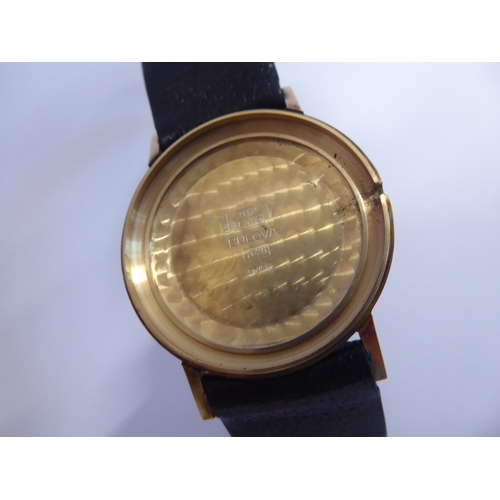 46 - Bulova 9ct gold cased wristwatch (long service inscription to back) on original leather strap in box