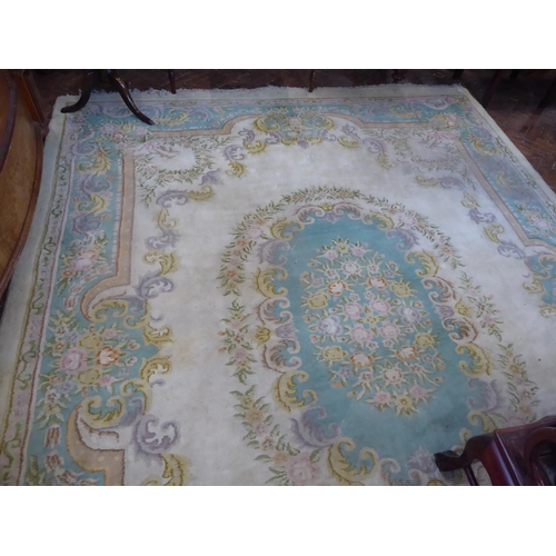 651 - Indian cream ground woollen carpet (142