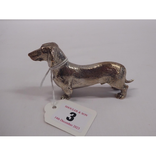 3 - Silver plated Dachshund figure and a gilt metal crystal fish (2)