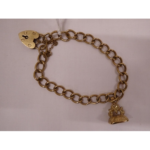 38 - 9ct gold bracelet with padlock clasp and fob attached (17.5g)