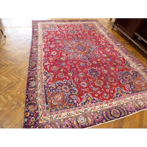 575 - Red and blue ground Persian Mashad carpet (151