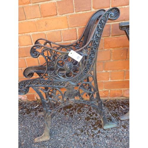 13 - Pair of cast iron garden bench ends with lion mask motif and pair table ends