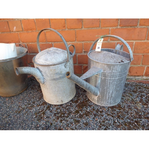 38 - Galvanised watering cans and buckets, stainless steel milk bucket and enamel jug (5)