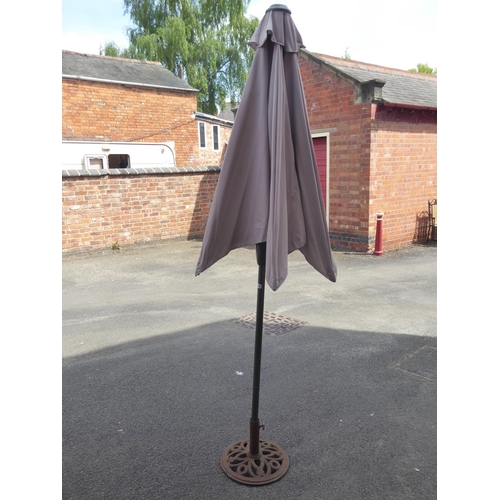 19 - Garden parasol with cast iron base