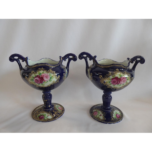 134 - Pair of Vienna type cobalt blue porcelain vases on plinths with nymph panels titled Ruby and Pearl -... 