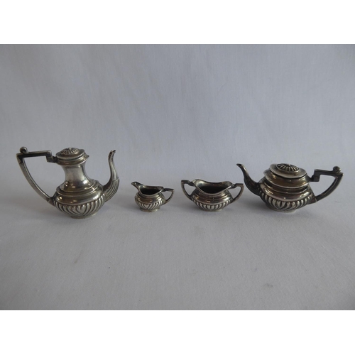 29 - Miniature silver tea set on tray - London 1974