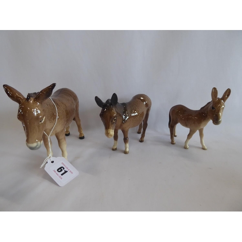 61 - Beswick donkey family figures (3)