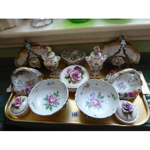 145 - Continental porcelain floral relief bowls, vases, pot pourri, baskets etc.