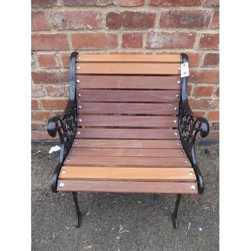 40 - Cast iron wooden slatted child's garden chair