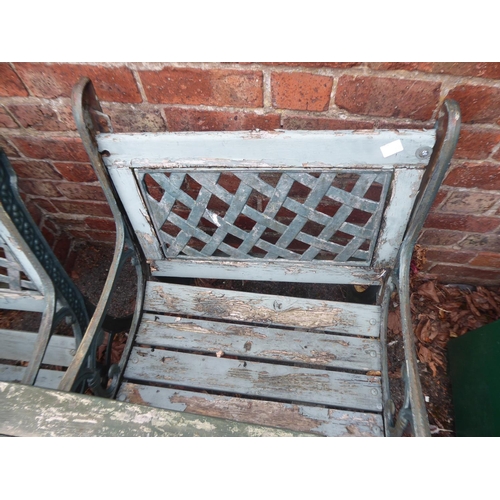 36 - Cast iron and wooden slatted garden table, bench and 2 chairs (in need of new wood)