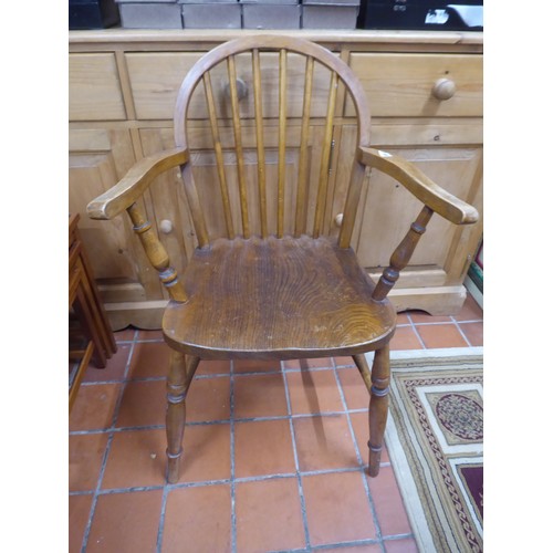 556 - Elm and beech hoop back windsor type elbow chair