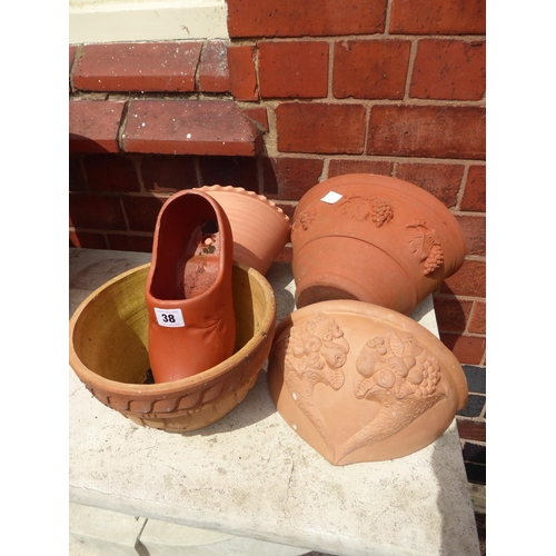 38 - Terracotta wall pocket planters, clog etc. (5)