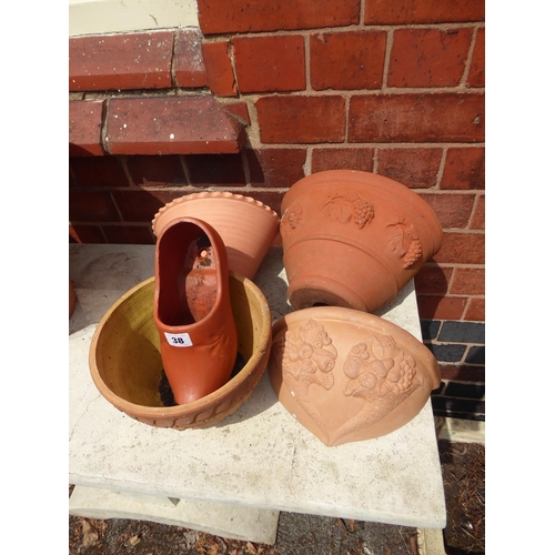 38 - Terracotta wall pocket planters, clog etc. (5)