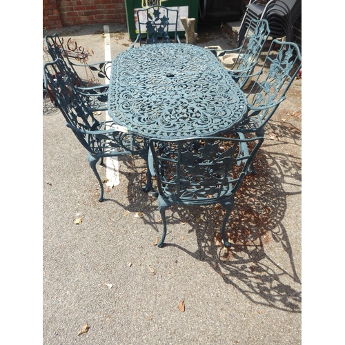 45 - Cast alloy garden table and 6 chairs