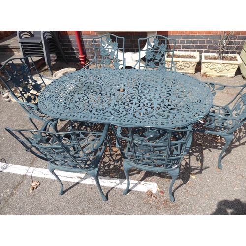 45 - Cast alloy garden table and 6 chairs