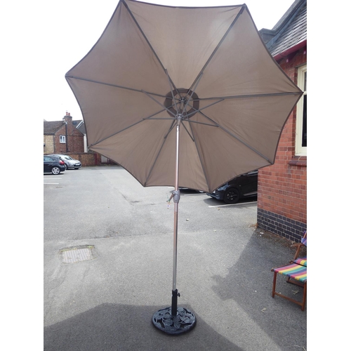 47 - Wind out parasol and cast iron base