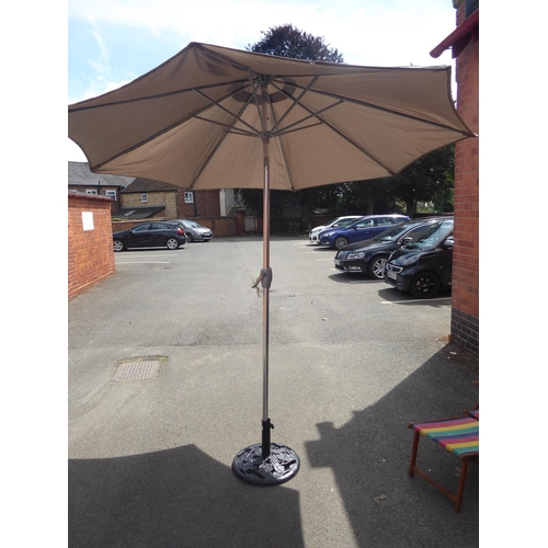 47 - Wind out parasol and cast iron base