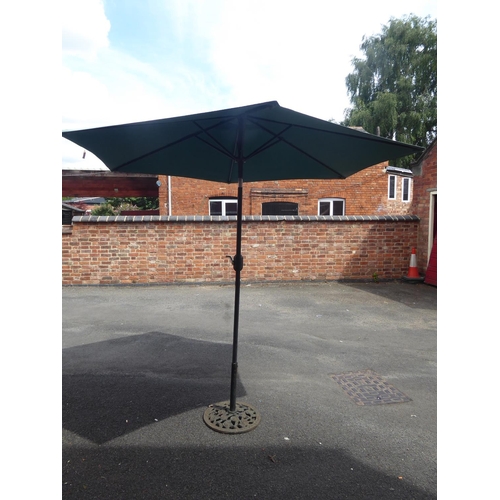 48 - Wind out parasol and cast iron base