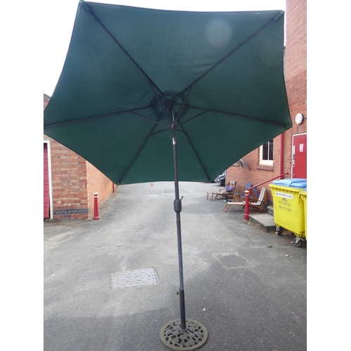 48 - Wind out parasol and cast iron base