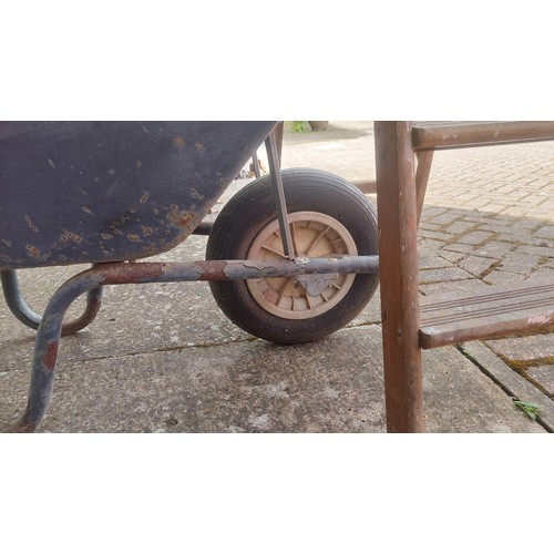 23 - Wheel barrow and step ladder