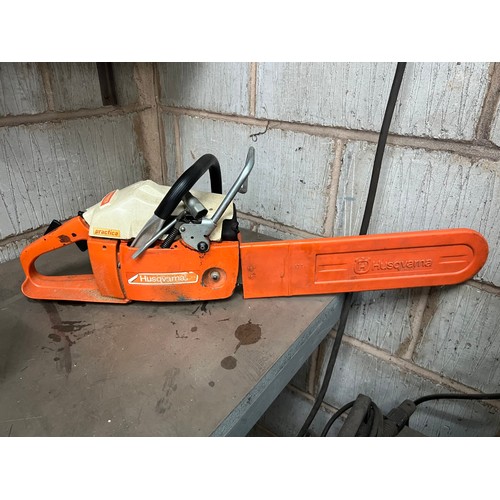 133 - Husqvarna 44 Chainsaw 15 inch - has compression