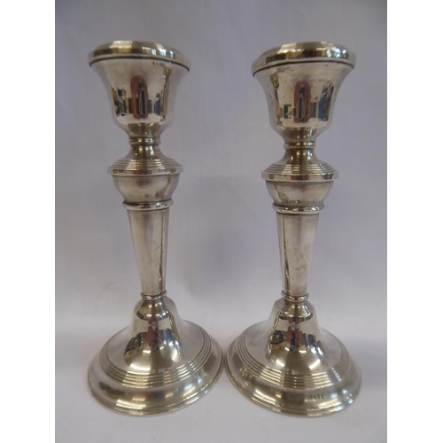 12 - Pair of silver candlesticks (5