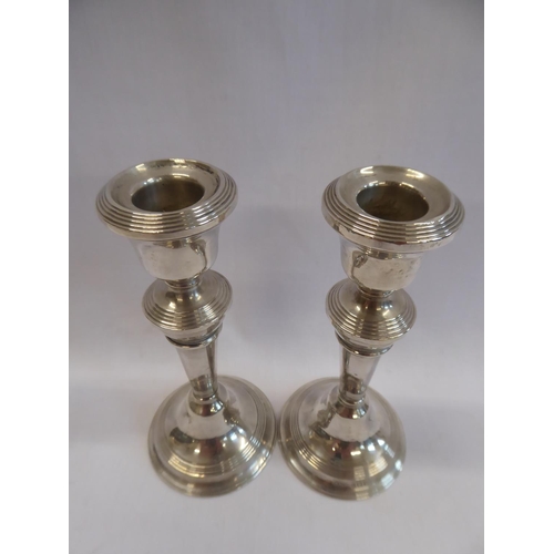 12 - Pair of silver candlesticks (5
