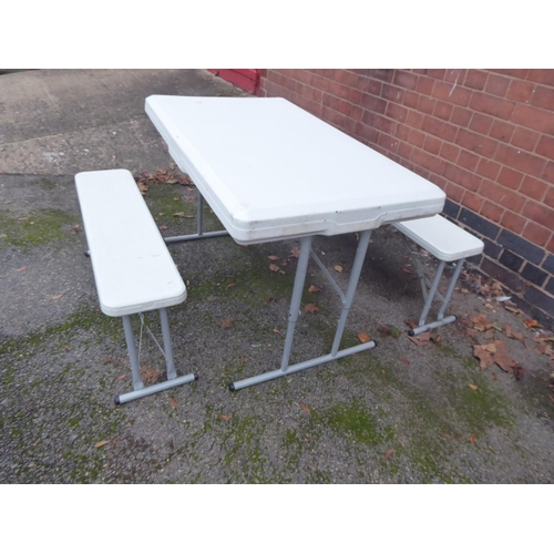 10 - Hard plastic picnic table and bench set (3)