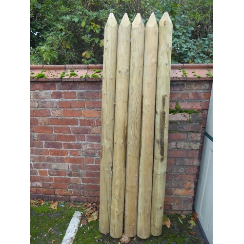 31 - Wooden fencing stakes