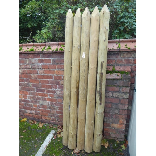 31 - Wooden fencing stakes