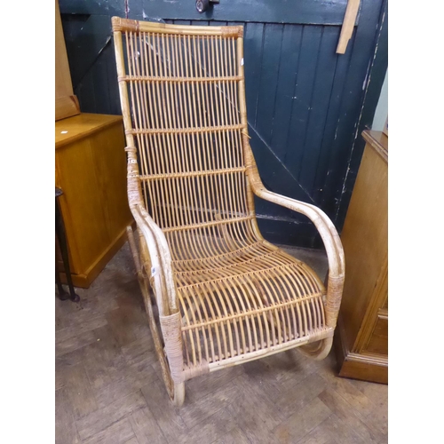 490 - Vintage cane rocking chair