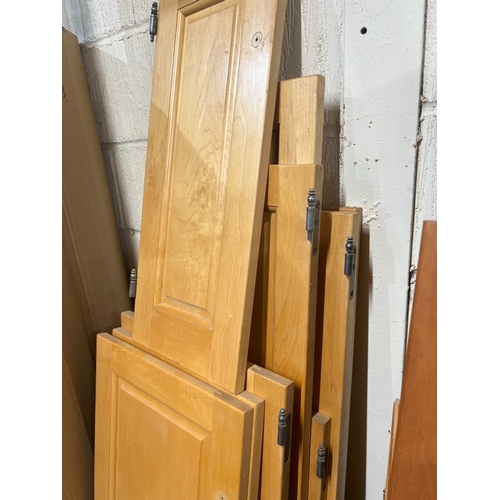 43 - Approx 16 Maple cupboard doors