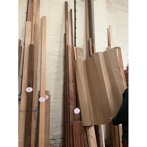 5 - Qty of mixed lengths of American Walnut and Iroko wood averaging 2.6m x 40mm and 5mm