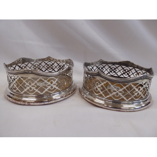 47 - Pair silver plated bottle coasters