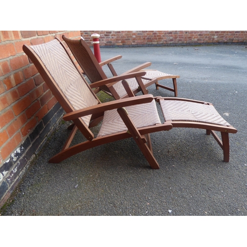25 - Pair of teak faux rattan steamer chairs