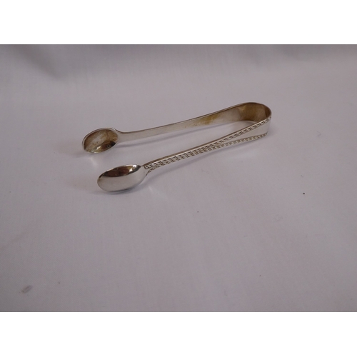 15 - Cased set of 6 silver teaspoons and sugar nips - Sheffield 1910