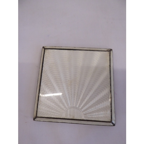 28 - Enamelled silver compact - Asprey's, engine turned silver matchbook case & a cased marcasite manicur... 