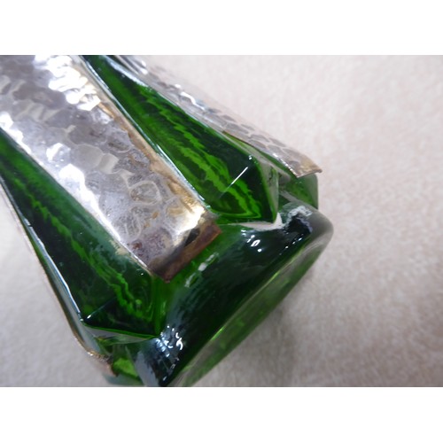 30 - Arts and crafts twin handled hammered polished pewter mounted green glass vase