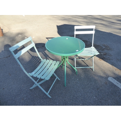 4 - Glass top garden table and 2 folding metal slatted chairs