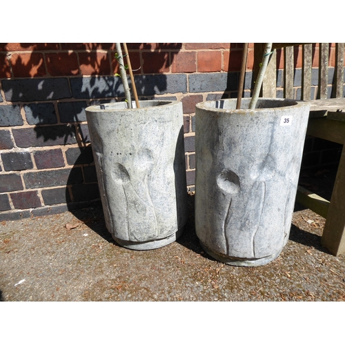 35 - Pair of cylindrical concrete planters (planted with standard hibiscus trees)
